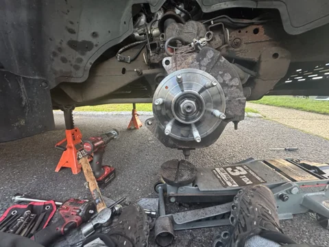 Wheel hub on the vehicle with the brake rotor removed.