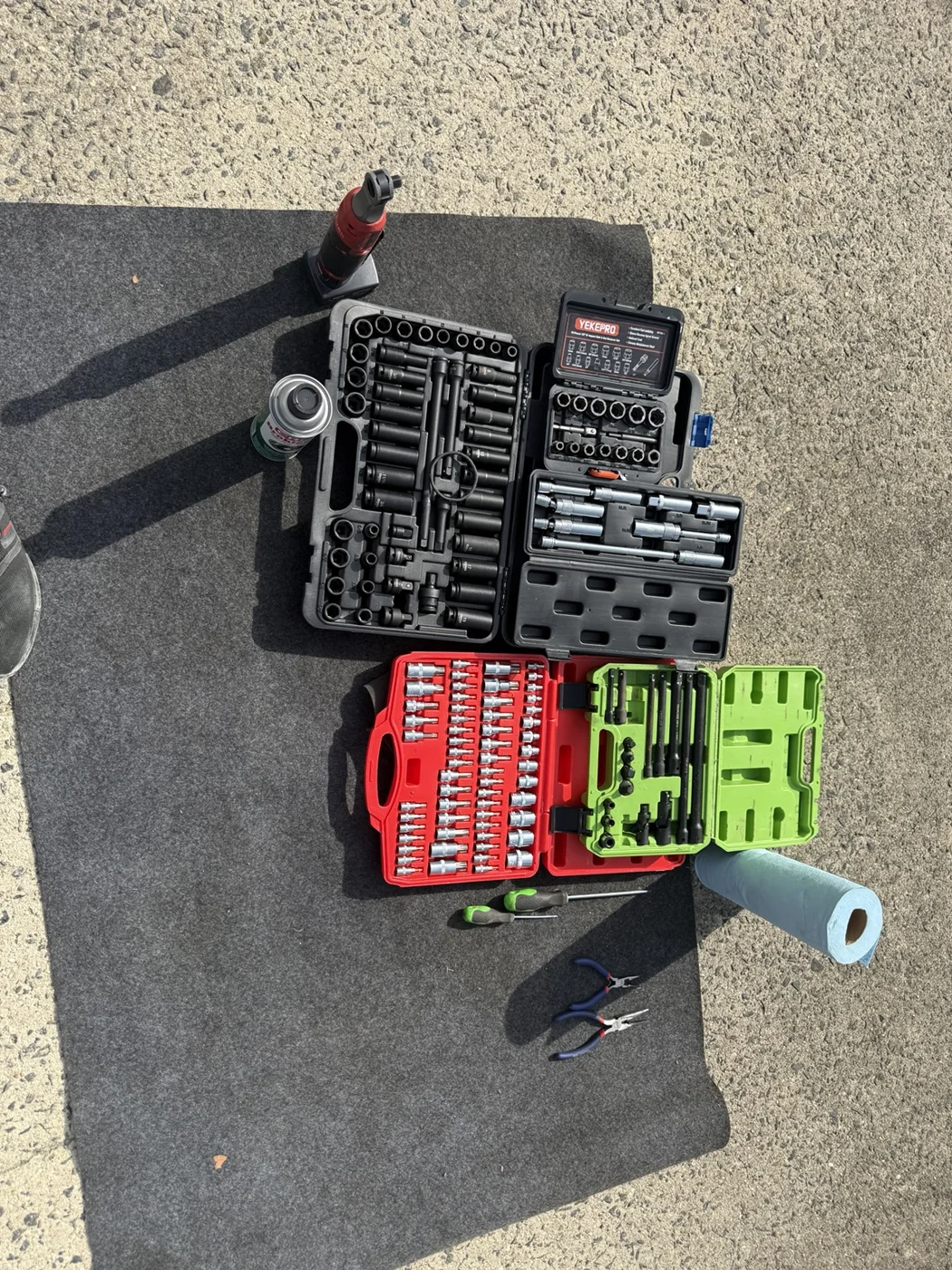 Organized hand tools laid out at an on-site work area